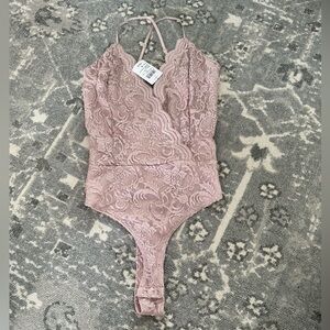 NWT nude lace bodysuit